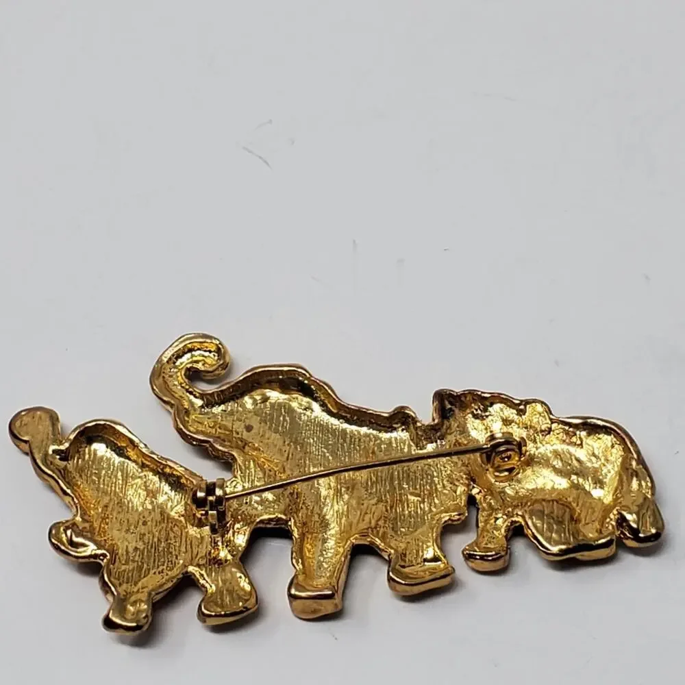 Vintage Gold tone & Enamel walking elephant brooch Great condition